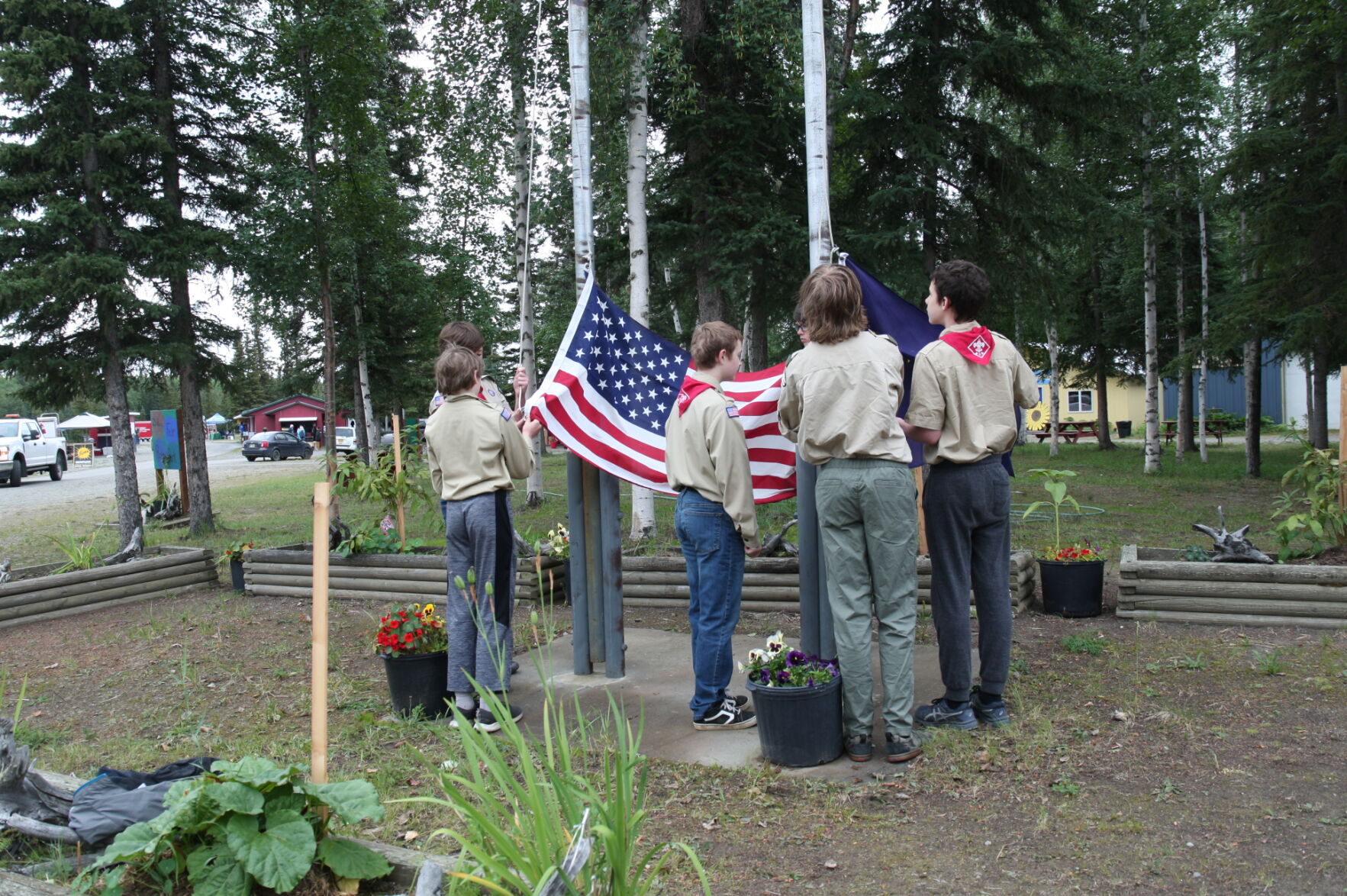 Deltana Fair Scouts raise flags